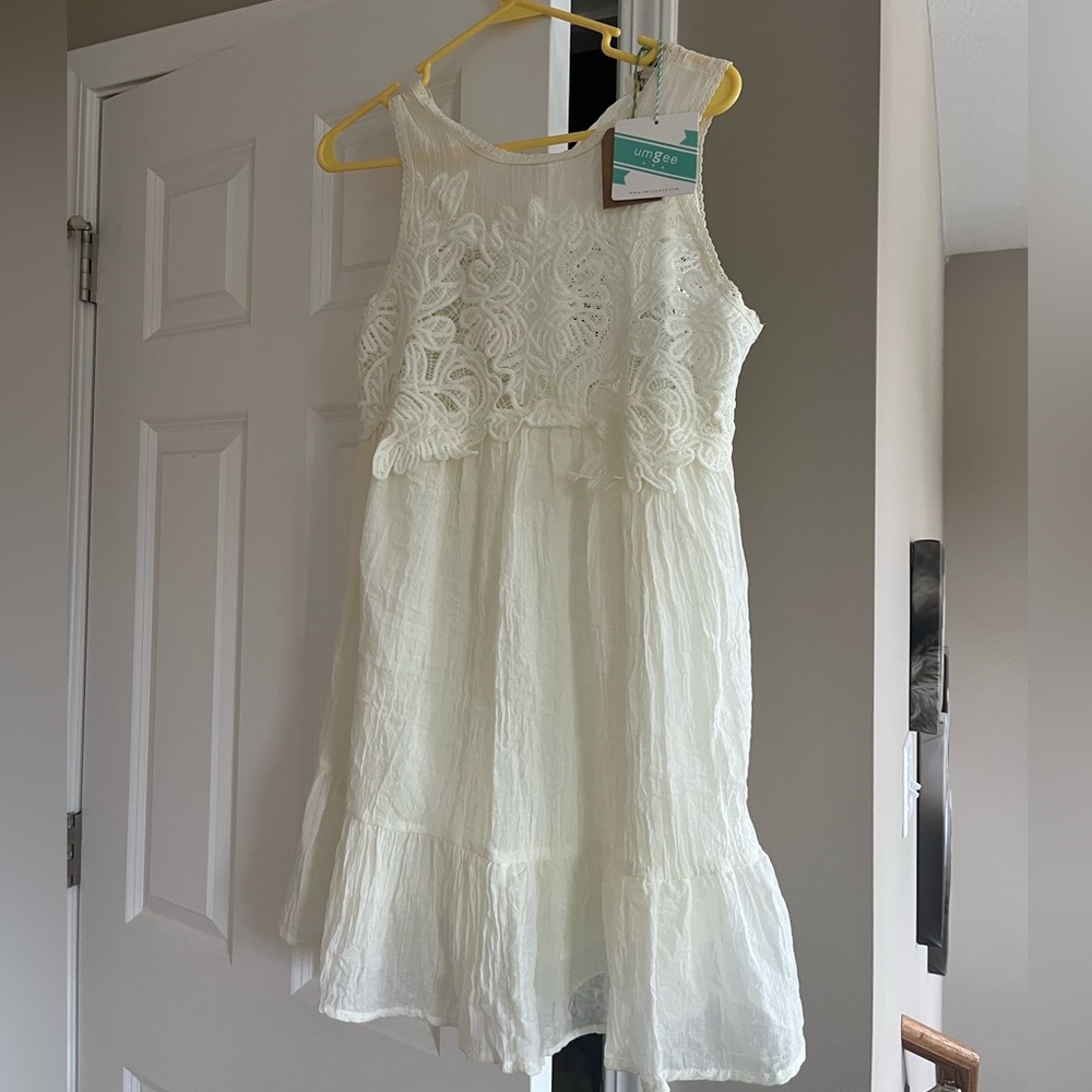 Brand new, with tags detailed cream dress